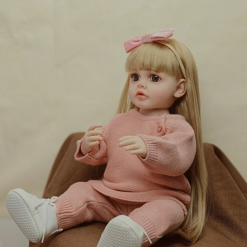 Bebe Reborn Menina De Cabelos Compridos Em Vestido Rosa, Olhos Abertos - 55Cm/22"